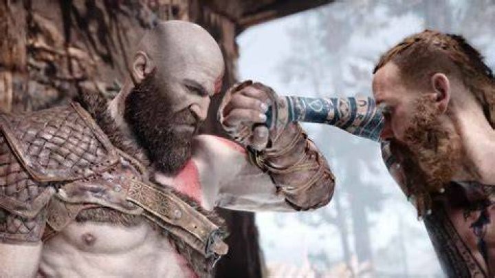 God of War The Stranger and Kratos