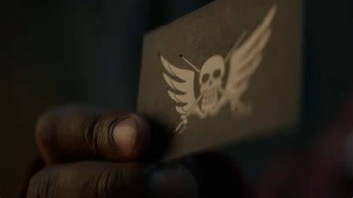 Who is Mr. Seven (7) from Baroque Works in One Piece Live Action? (Netflix) Mr-Seven-holding-Baroque-Works-card-in-One-Piece-Live-Action