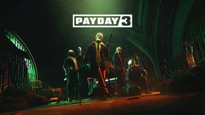 Payday 3: someone holding one of the bank robber's clown masks.